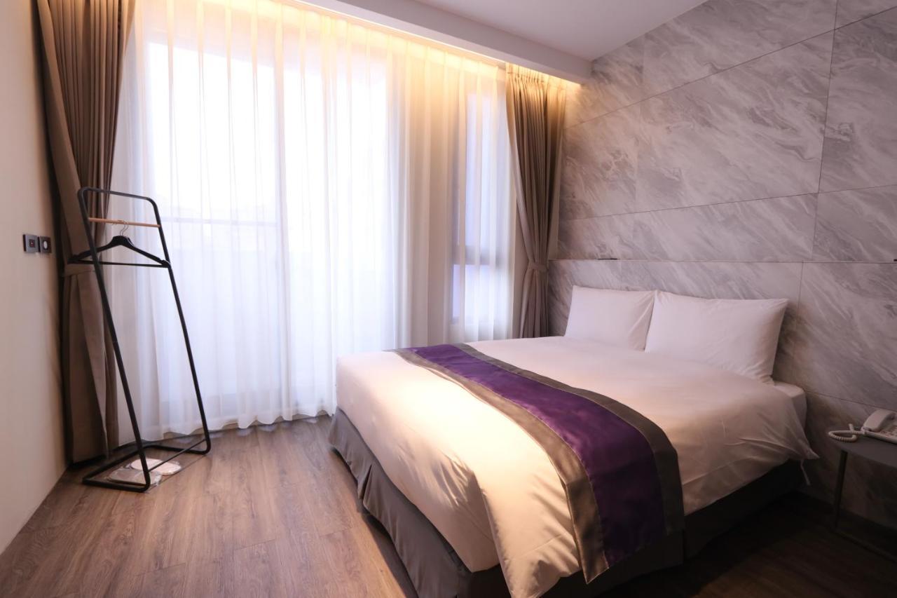 Hotel Hesper Hsr Тайджун Стая снимка